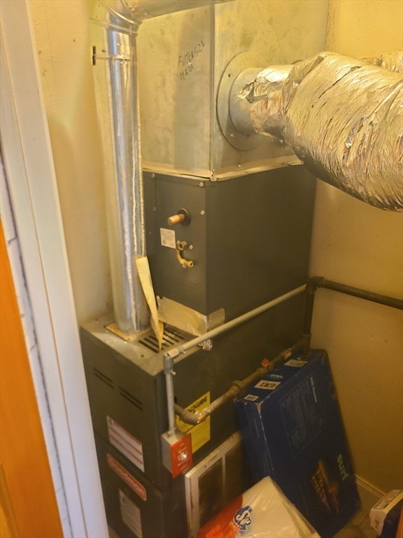 455 Washington Street Haverhill, MA 01832 - Photo 17 of 29 a bathroom with a sink and mirror