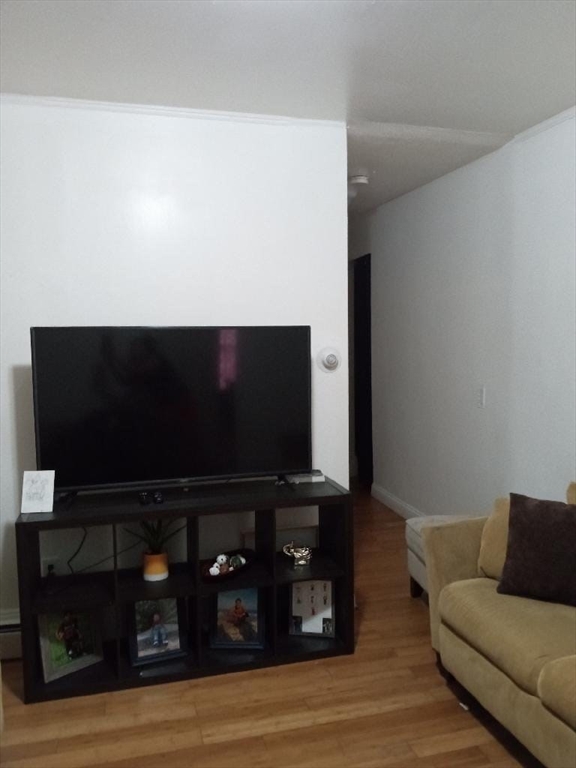455 Washington Street Haverhill, MA 01832 - Photo 18 of 29 a living room with furniture and a flat screen tv