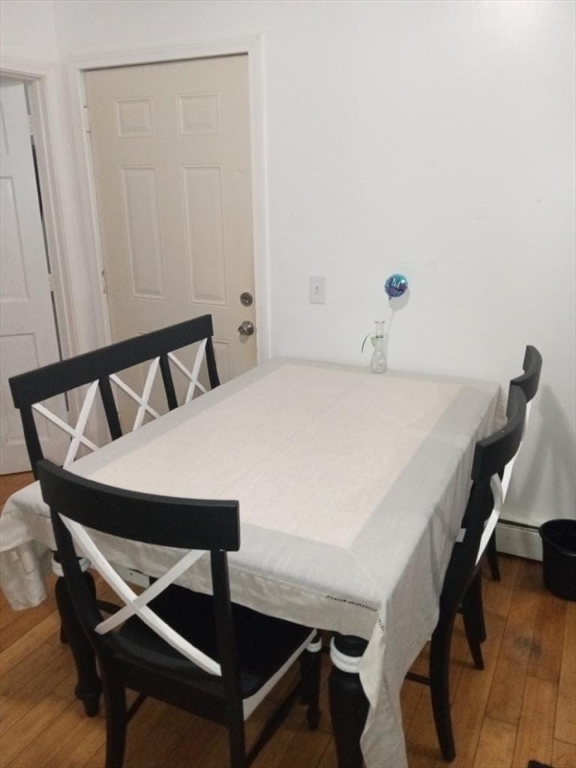 455 Washington Street Haverhill, MA 01832 - Photo 24 of 29 a view of a dining room with furniture and wooden floor