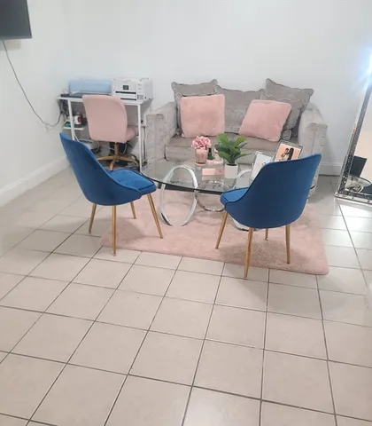 a living room with furniture and a couch