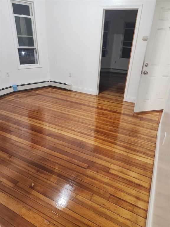 455 Washington Street Haverhill, MA 01832 - Photo 3 of 29 wooden floor in a white building