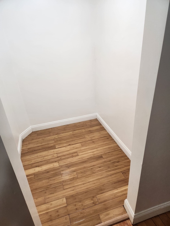455 Washington Street Haverhill, MA 01832 - Photo 4 of 29 a view of a room with wooden floor