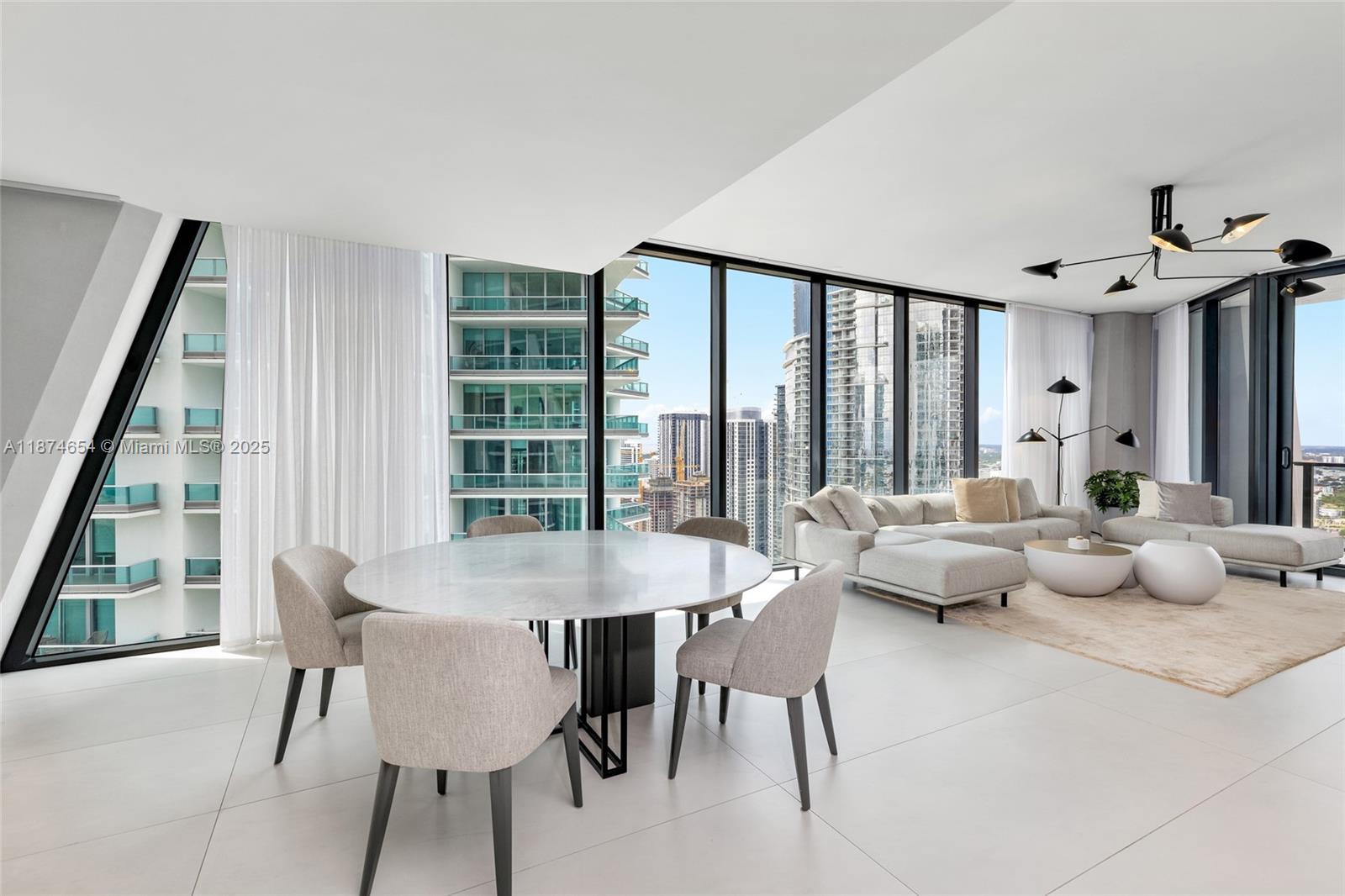 1000 Biscayne Boulevard, Unit 3801 Miami, FL 33132 - Photo 11 of 31 a view of a dining room with furniture window and outside view