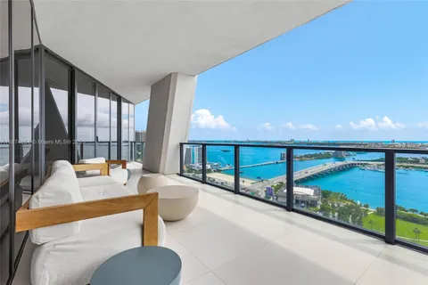 a view of a city with an ocean