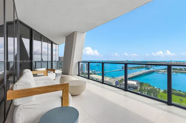 a view of a city with an ocean