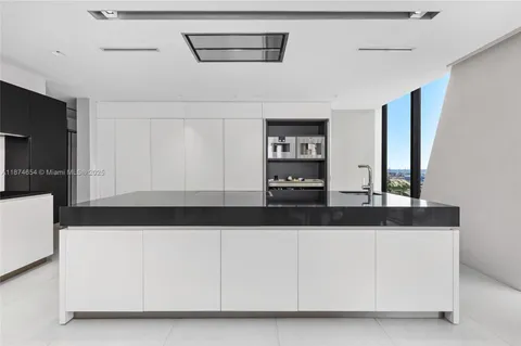 a view of living room with furniture and flat screen tv