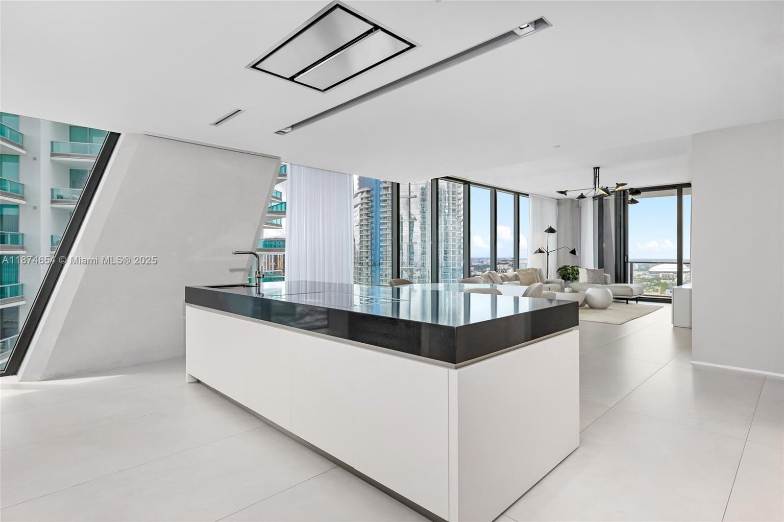 1000 Biscayne Boulevard, Unit 3801 Miami, FL 33132 - Photo 10 of 31 a view of living room with furniture and flat screen tv