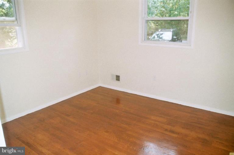 4901 Split Rock Road Alexandria, VA 22310 - Photo 12 of 19 Fresh paint & gleaming hardwood floors.