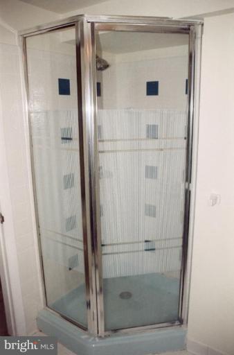 4901 Split Rock Road Alexandria, VA 22310 - Photo 18 of 19 Lower level bath w/shower & custom tile.