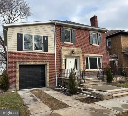 a front view of a house with yard