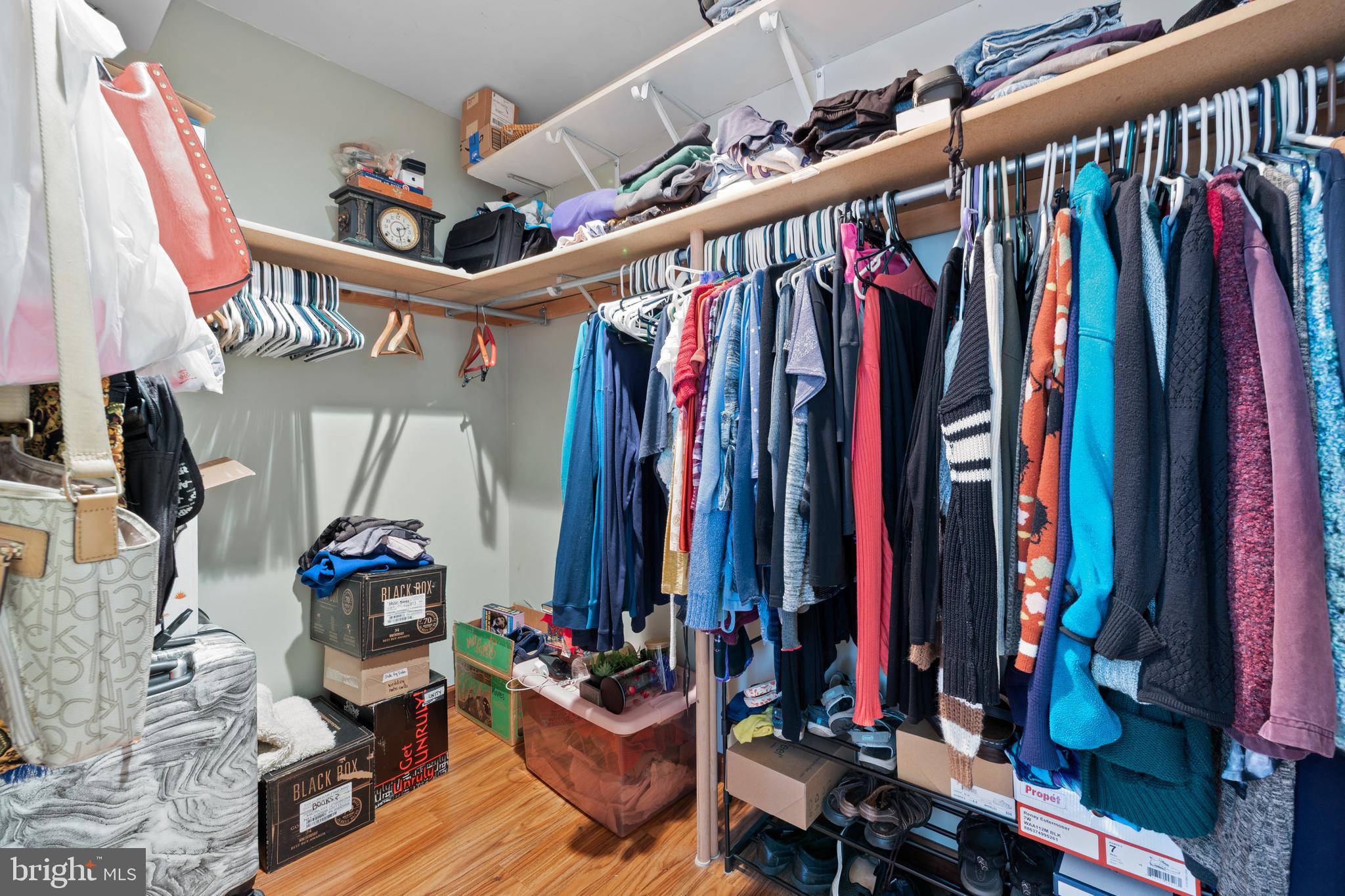 2645 West Buck Road East Greenville, PA 18041 - Photo 19 of 55 a view of walk in closet with clothes and shoes