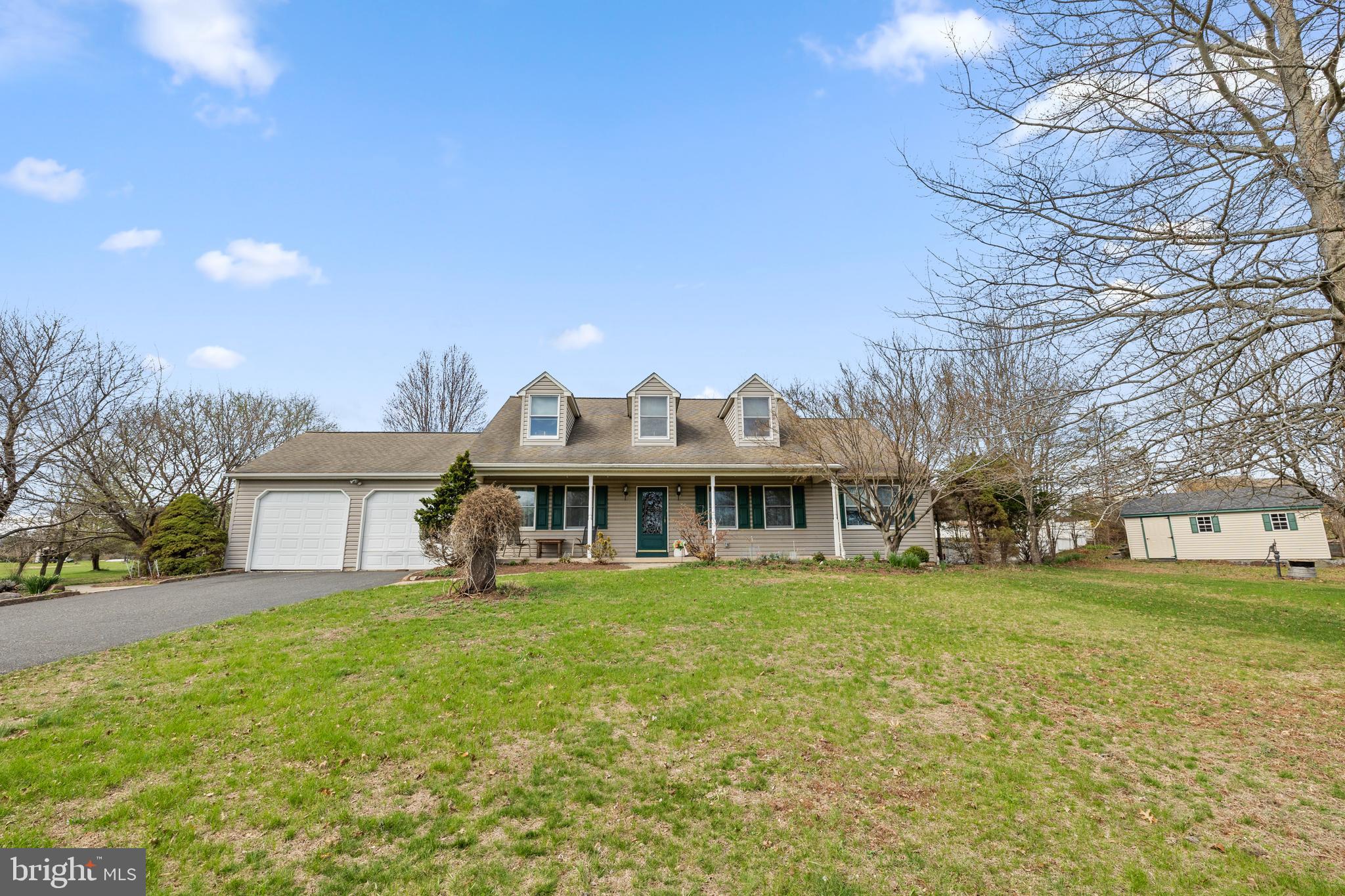 2645 West Buck Road East Greenville, PA 18041 - Photo 2 of 55 a view of a house with a big yard and large trees