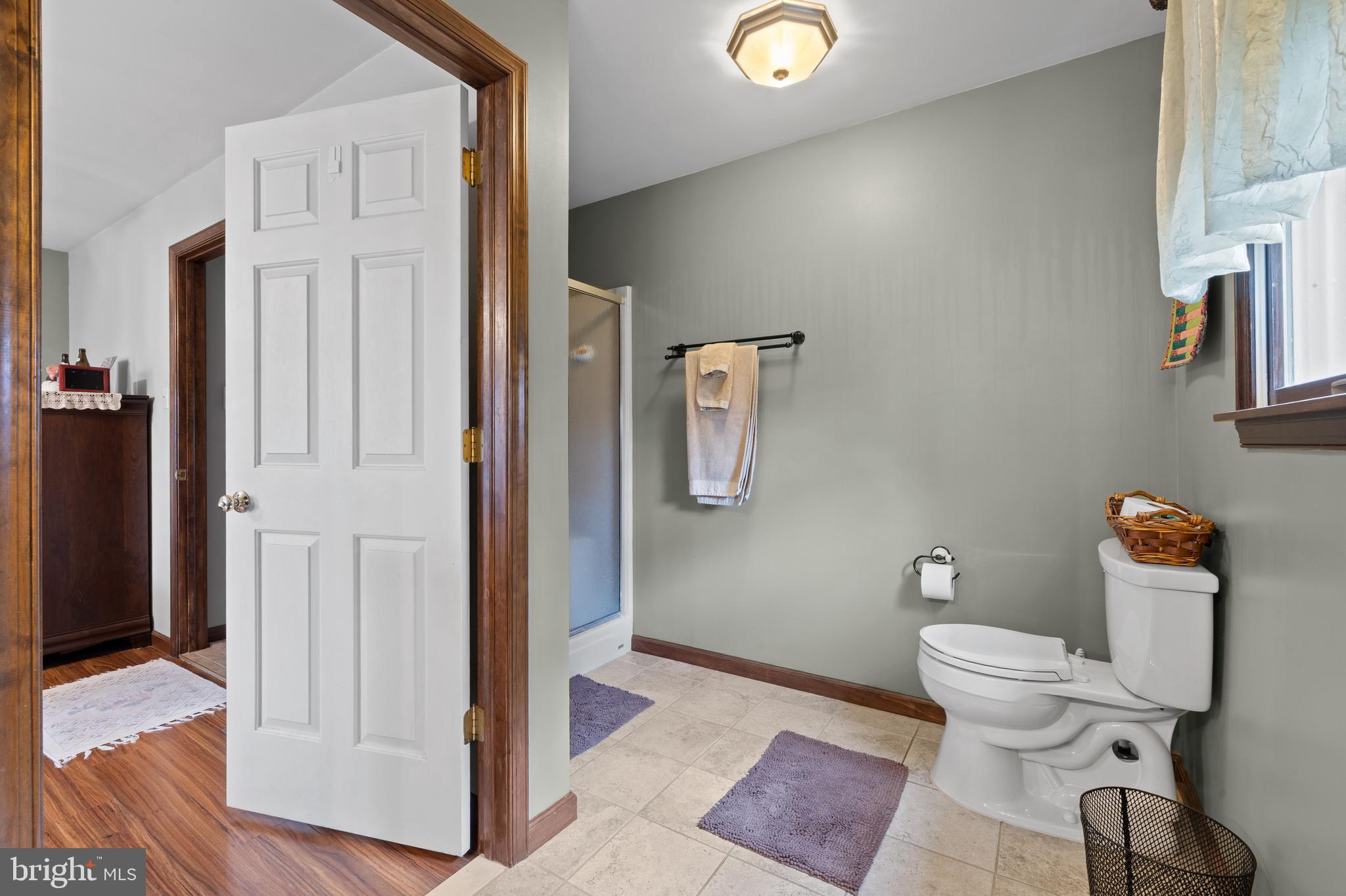 2645 West Buck Road East Greenville, PA 18041 - Photo 22 of 55 a bathroom with a toilet and a shower