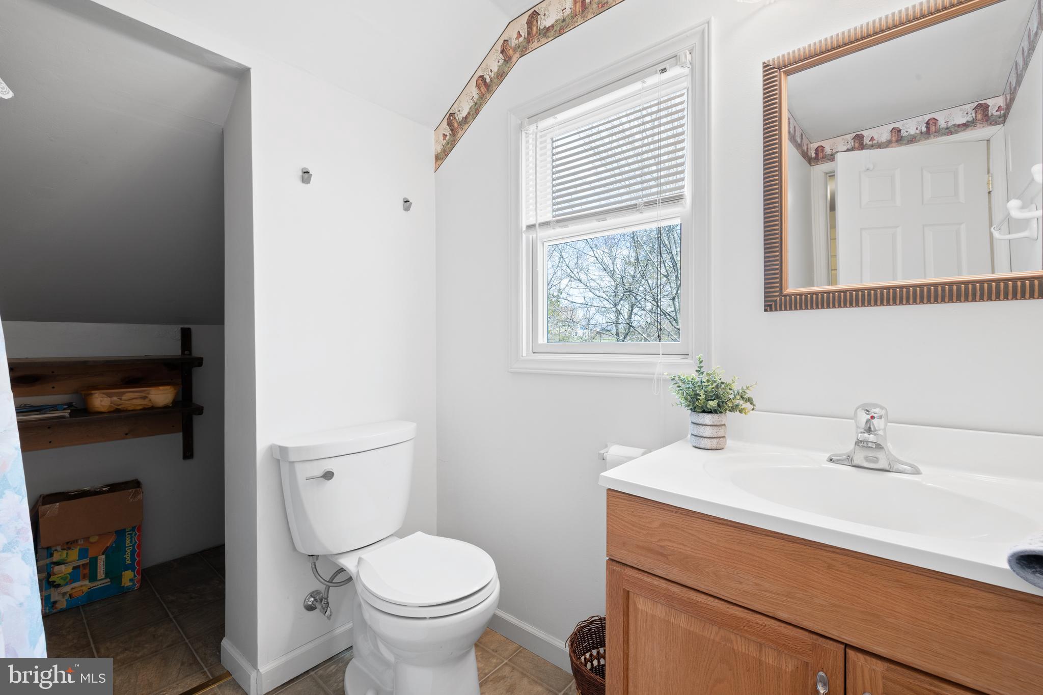 2645 West Buck Road East Greenville, PA 18041 - Photo 35 of 55 a bathroom with a sink toilet and a mirror
