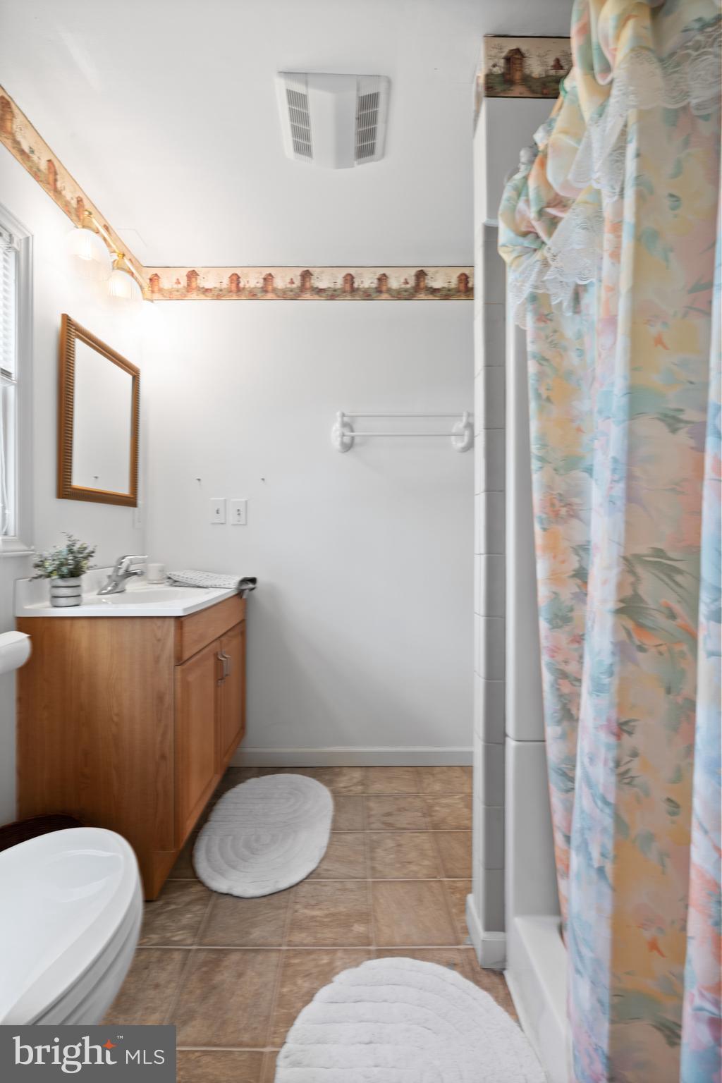 2645 West Buck Road East Greenville, PA 18041 - Photo 36 of 55 a bathroom with a toilet a sink and shower