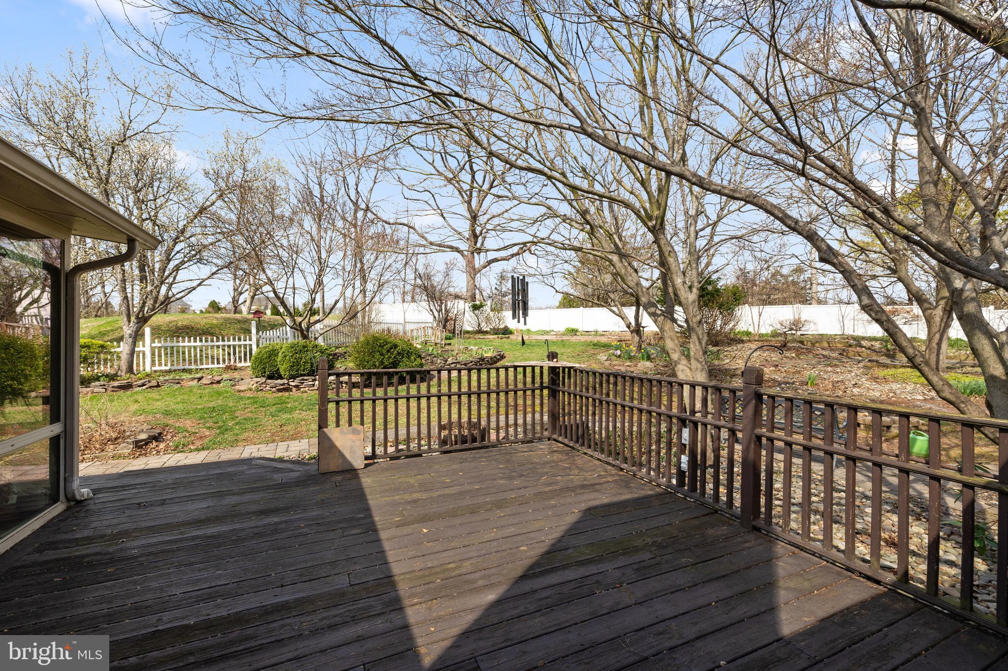 2645 West Buck Road East Greenville, PA 18041 - Photo 42 of 55 a view of street with wooden deck next to a yard