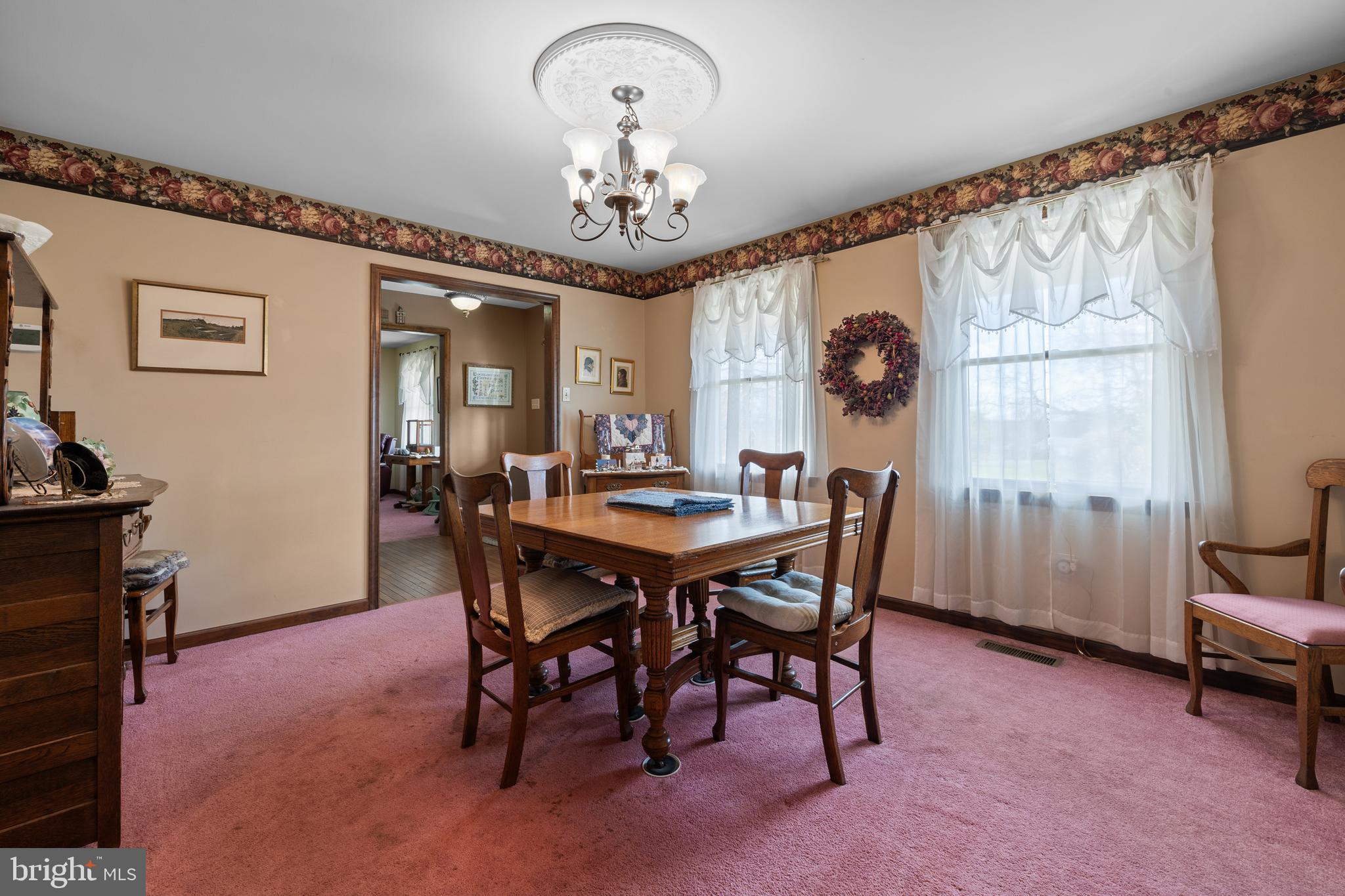 2645 West Buck Road East Greenville, PA 18041 - Photo 5 of 55 a view of a dining room with furniture window and outside view