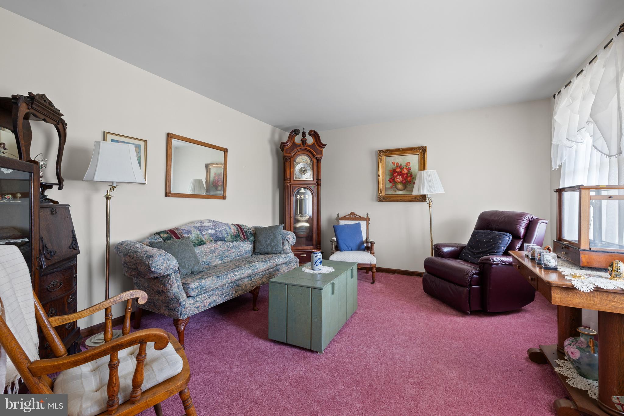 2645 West Buck Road East Greenville, PA 18041 - Photo 7 of 55 a living room with furniture and a flat screen tv