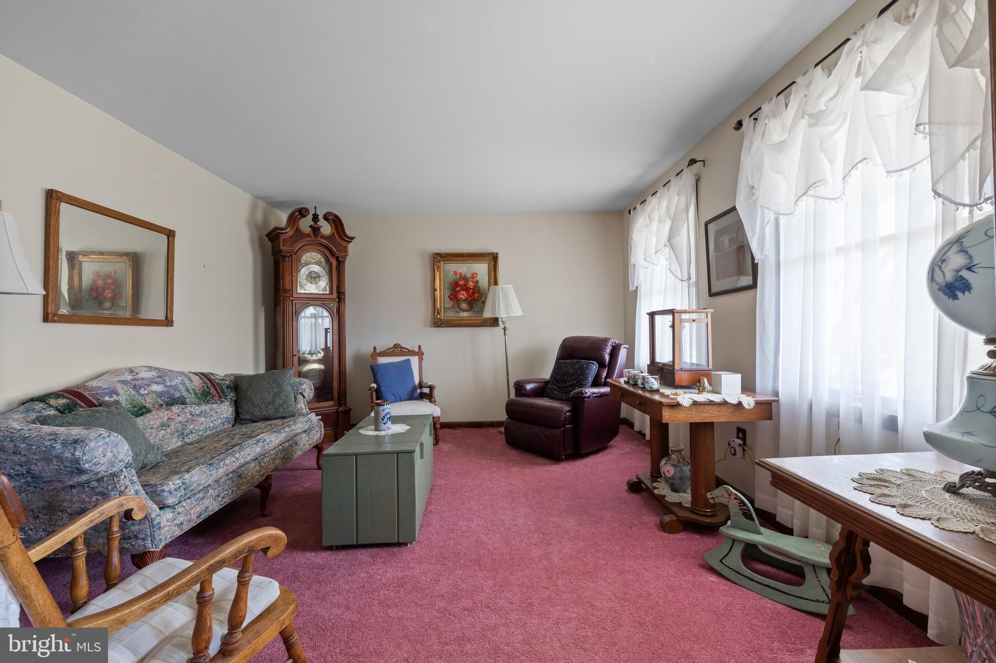 2645 West Buck Road East Greenville, PA 18041 - Photo 8 of 55 a living room with furniture rug and a window