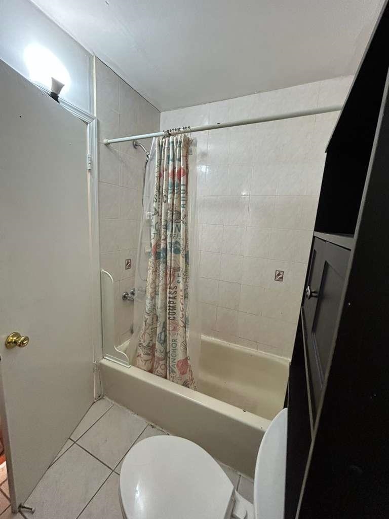 805 Secaucus Road, Unit 2 Jersey City, NJ 07307 - Photo 17 of 21 a bathroom with a shower and a toilet
