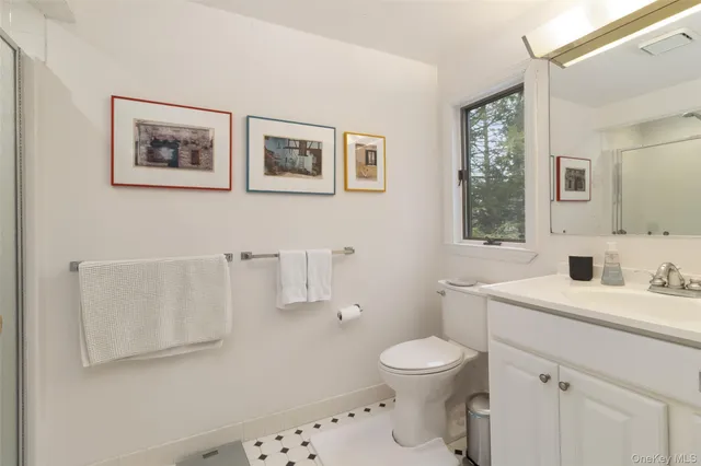 a view of a livingroom with furniture and a fireplace