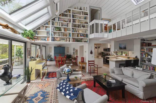 a view of a living room and dining room