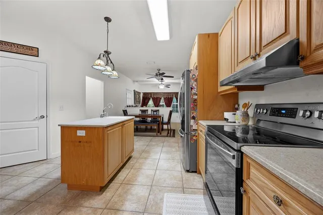 a view of a workspace with furniture and gym equipment