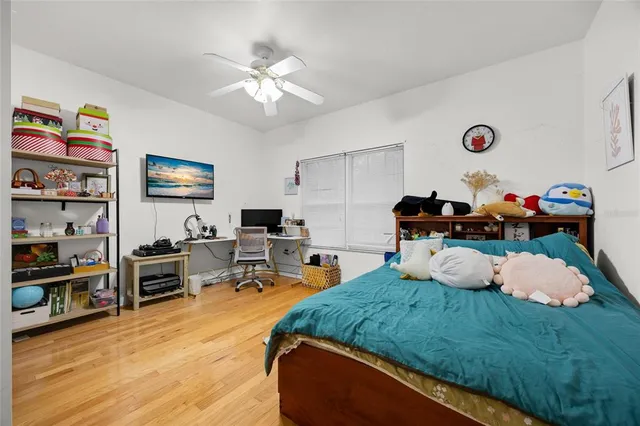 a bedroom with a bed and a walk in closet
