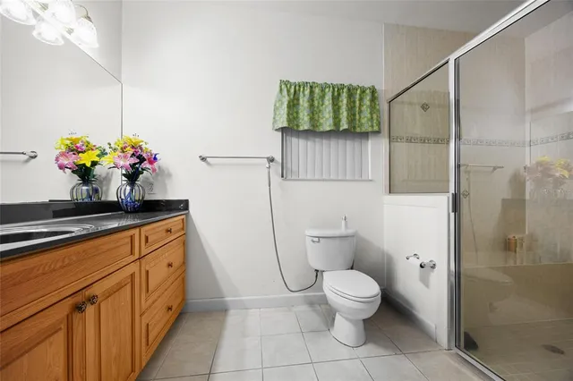 a utility room with sink dryer and washer