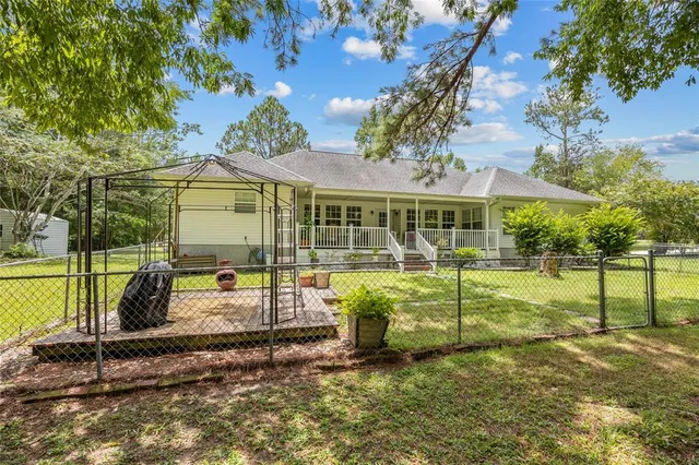 a view of a playground with basketball court