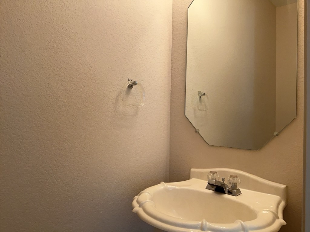 1511 Thibodeaux Drive Round Rock, TX 78664 - Photo 16 of 31 Bathroom featuring a textured wall