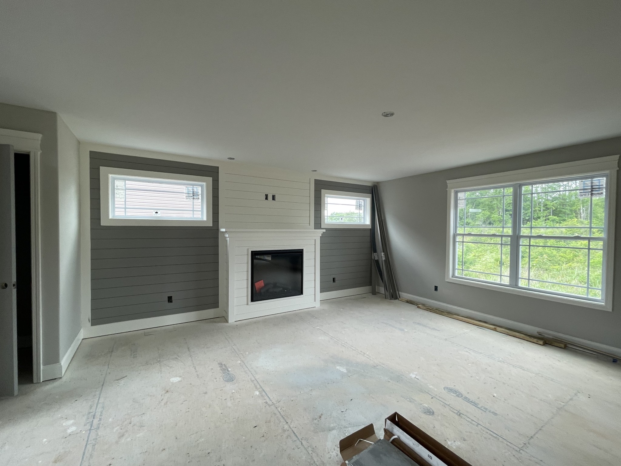 39 The Quarry Clarksville, TN 37043 - Photo 3 of 12 an empty room with windows fireplace and windows