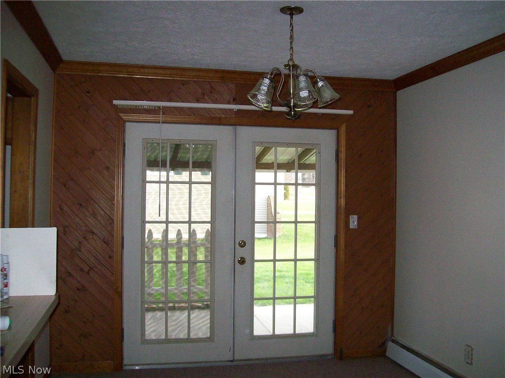 167 Fairview Road Geneva, OH 44041 - Photo 6 of 35 French Doors leading out to patio of main house. Kitchen to the left.