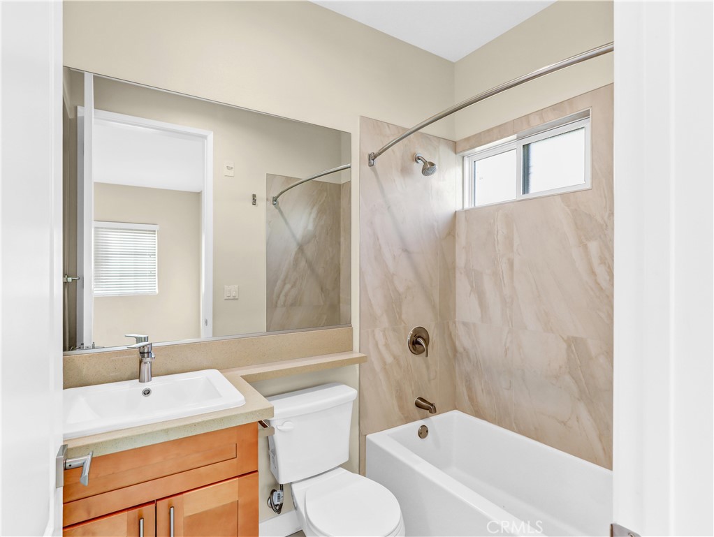 723 South Stoneman Avenue Alhambra, CA 91801 - Photo 10 of 11 a bathroom with a sink toilet tub and shower