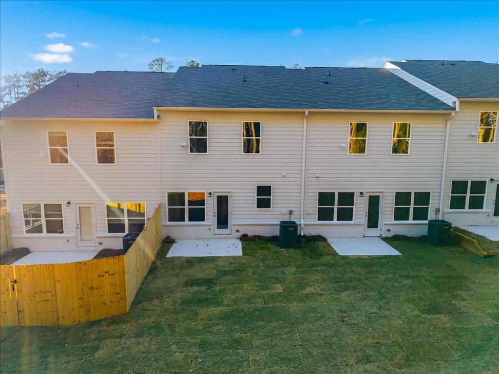 1833 Dawn Road, Unit 22 Conyers, GA 30013 - Photo 30 of 37 front view of a house with a yard