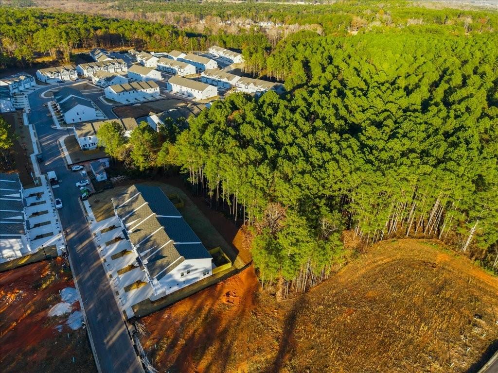 1833 Dawn Road, Unit 22 Conyers, GA 30013 - Photo 34 of 37 an aerial view of residential houses with outdoor space