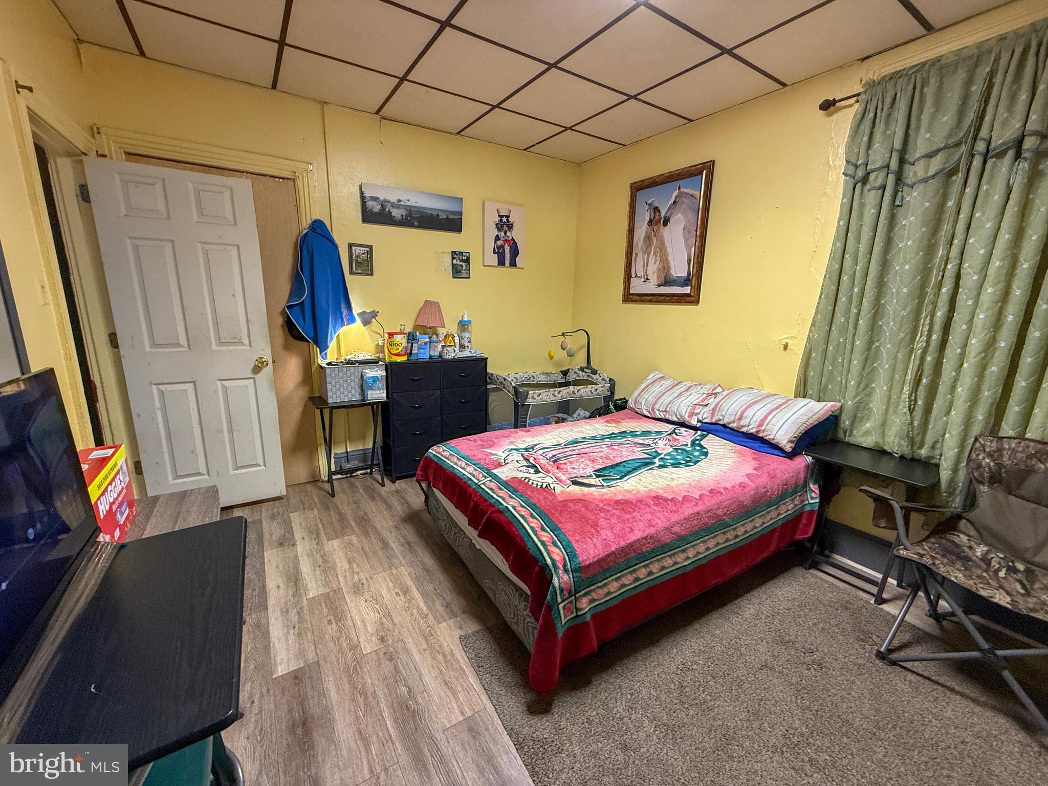114 North 10th Street Reading, PA 19601 - Photo 20 of 43 a bedroom with a bed and a desk