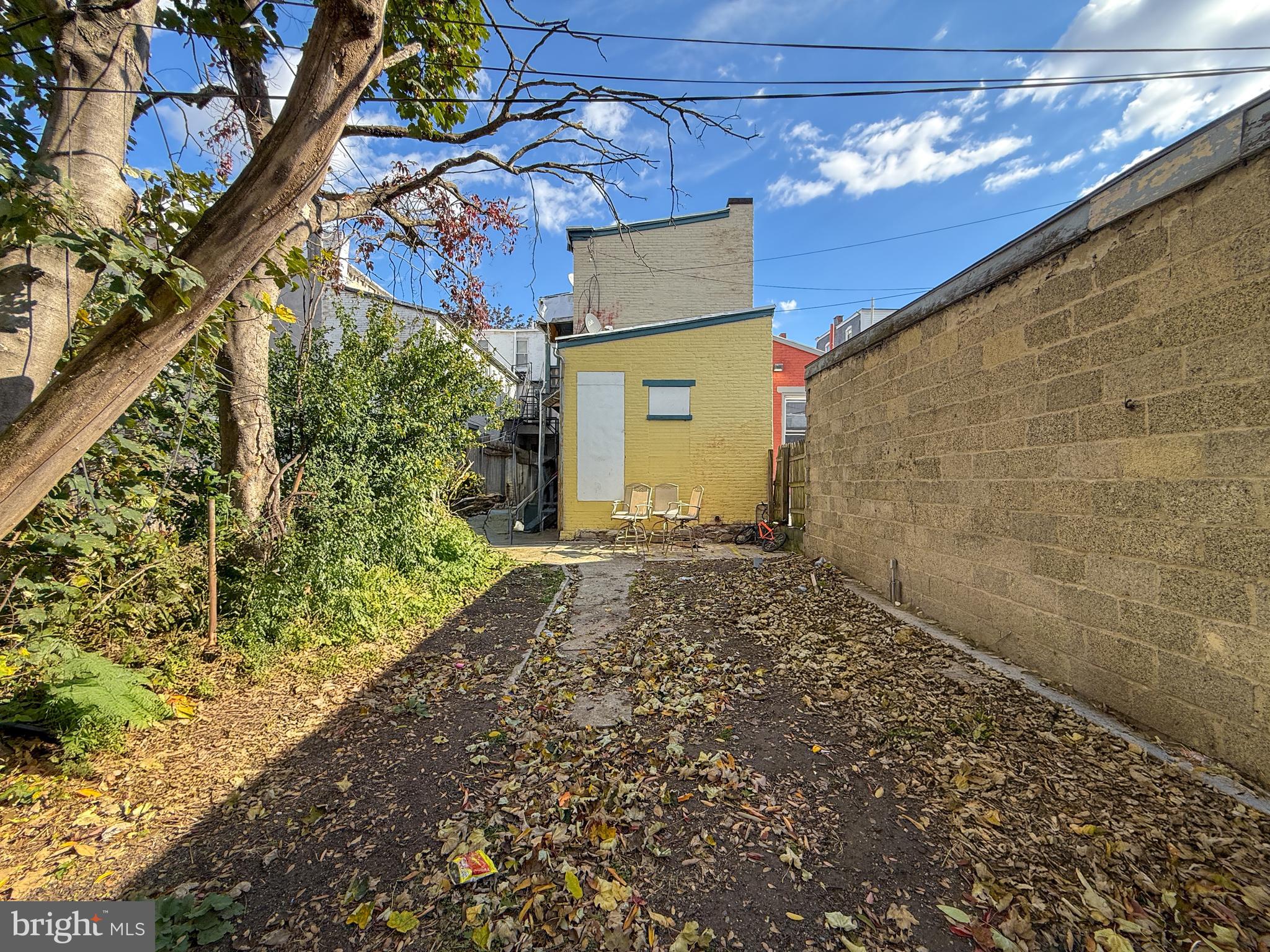 114 North 10th Street Reading, PA 19601 - Photo 22 of 43 a brick building with a large tree