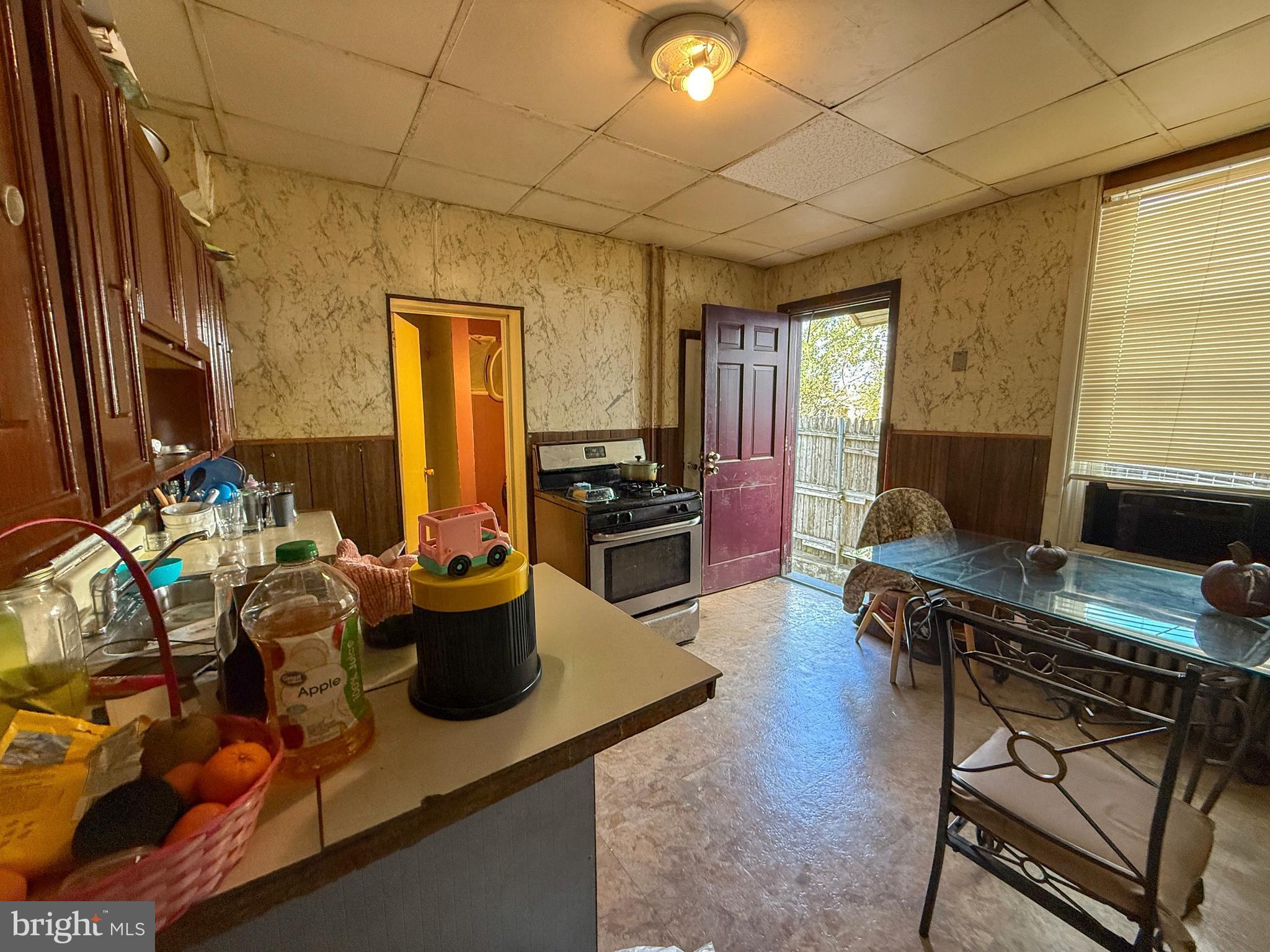 114 North 10th Street Reading, PA 19601 - Photo 39 of 43 a view of a workspace with furniture and a window
