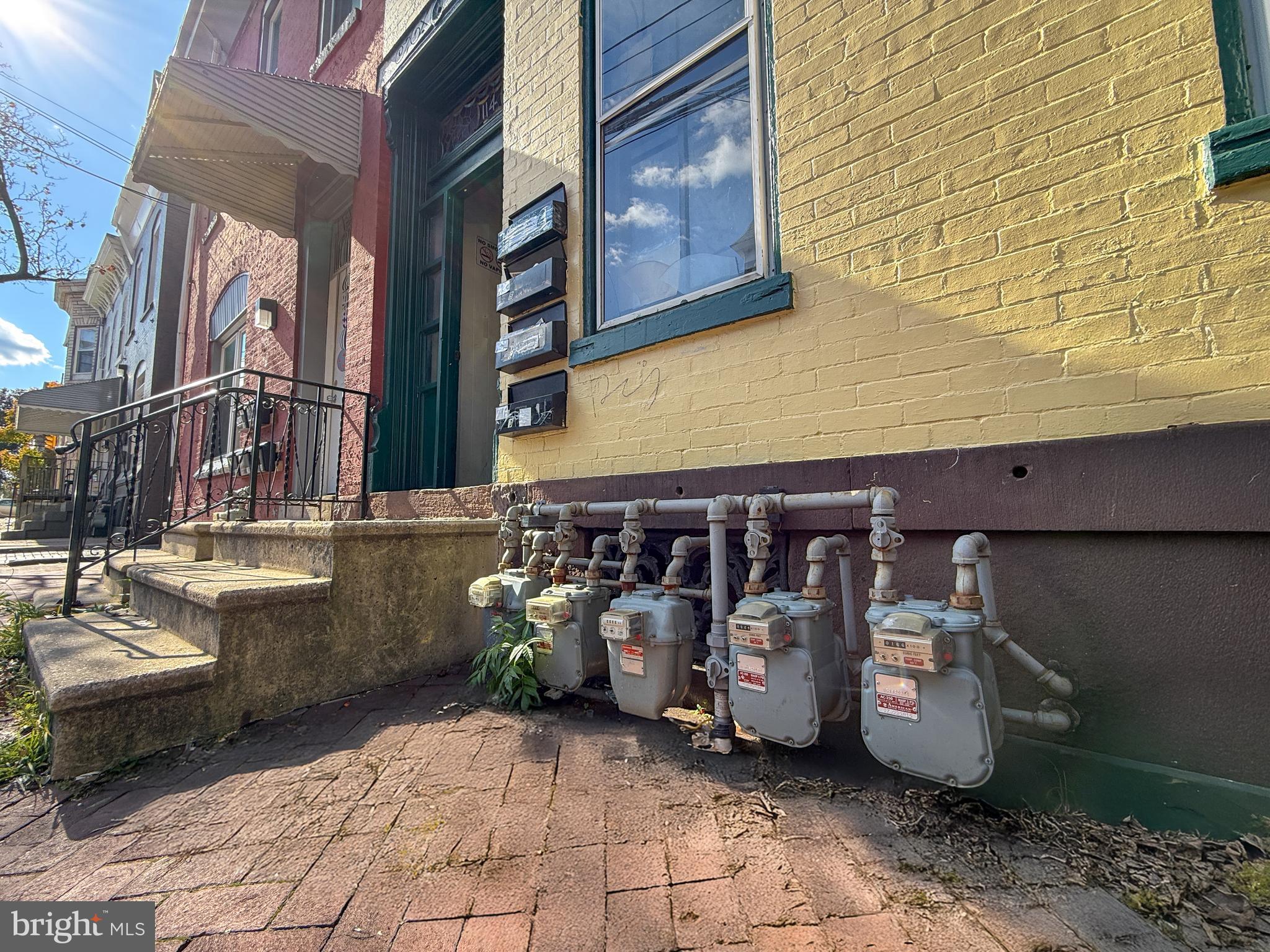 114 North 10th Street Reading, PA 19601 - Photo 41 of 43 a view of a patio with storage and utility