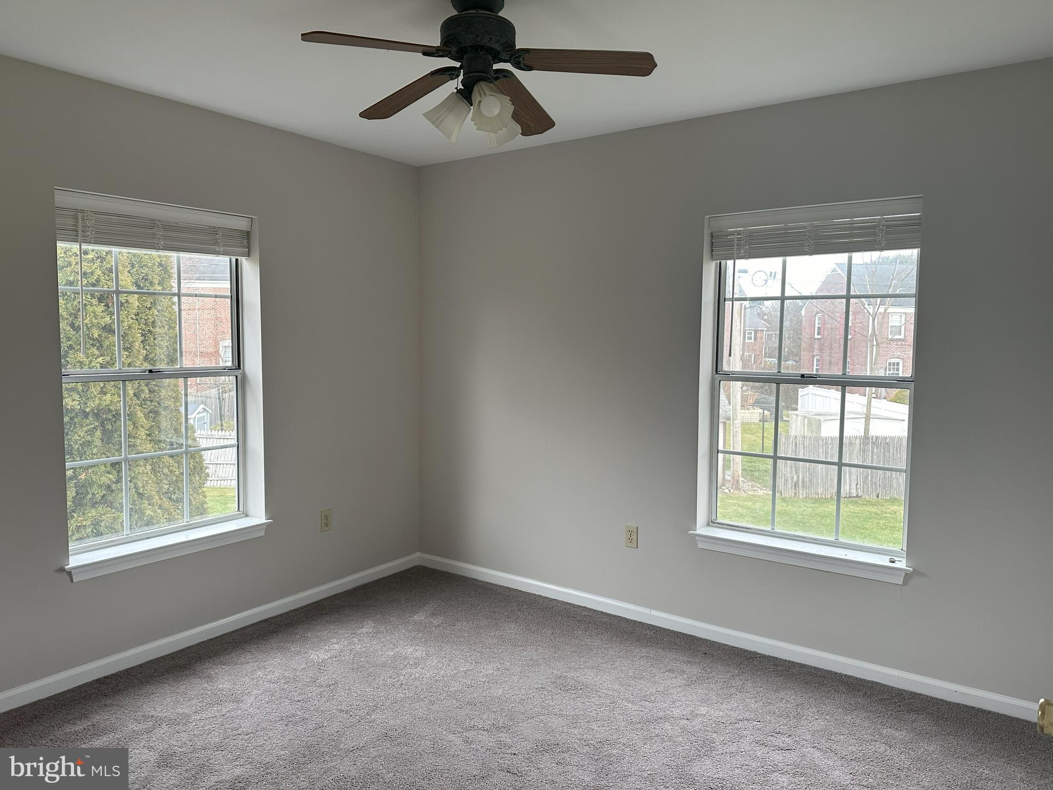 132 Delancy Place Lancaster, PA 17601 - Photo 13 of 14 an empty room with a window and a fan