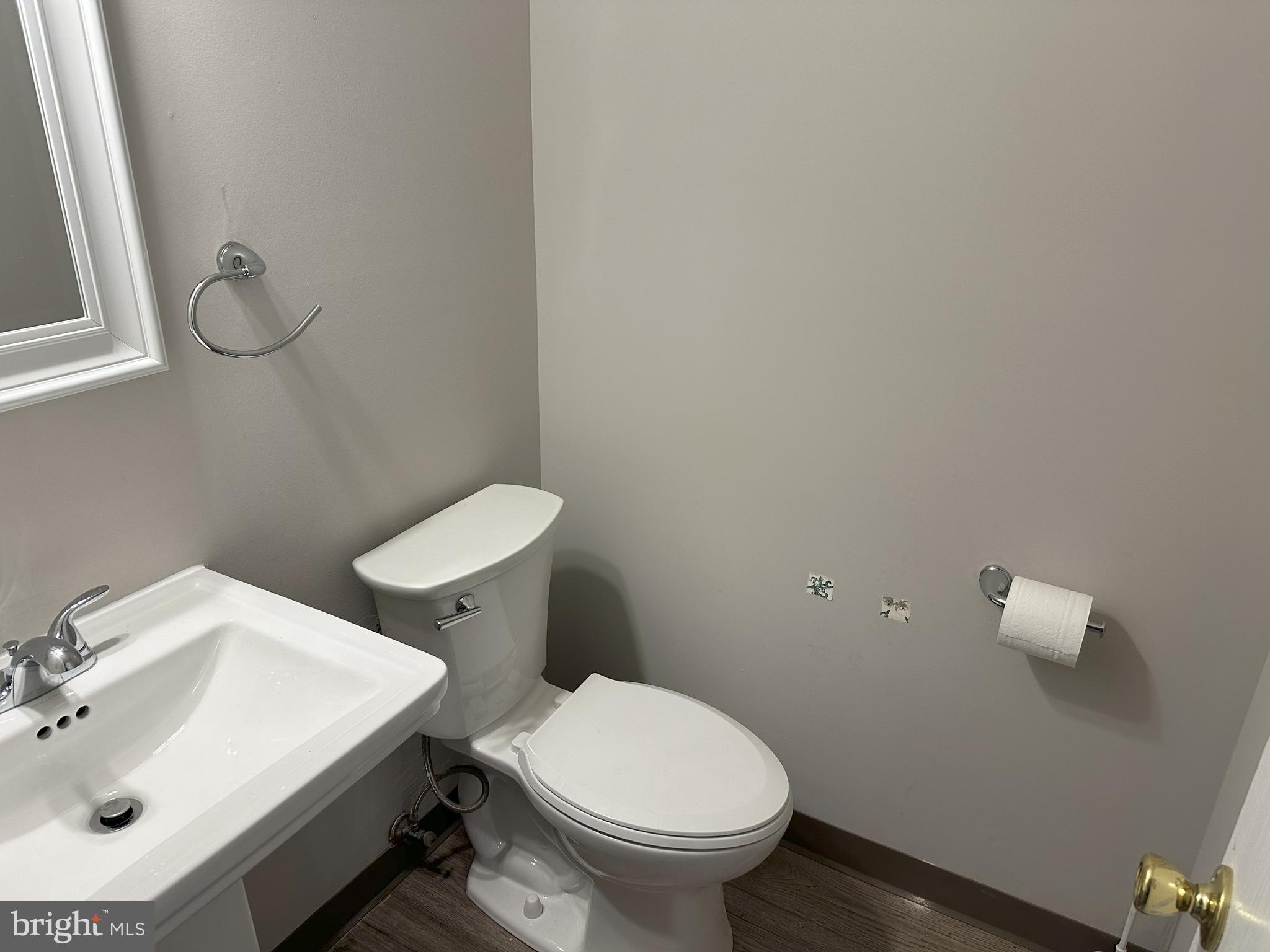 132 Delancy Place Lancaster, PA 17601 - Photo 8 of 14 a bathroom with a sink toilet and mirror
