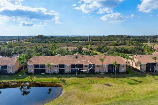 a aerial view of a house with swimming pool