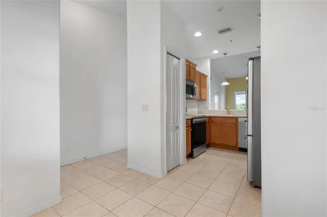 a view of a kitchen with a sink
