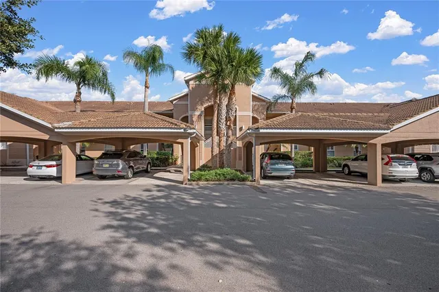 an aerial view of residential building and ocean