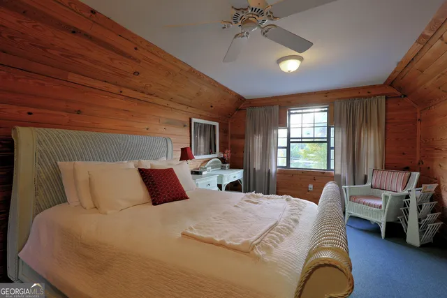 a kitchen with stainless steel appliances a stove and a microwave