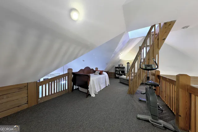 a view of a chair and table in the garden