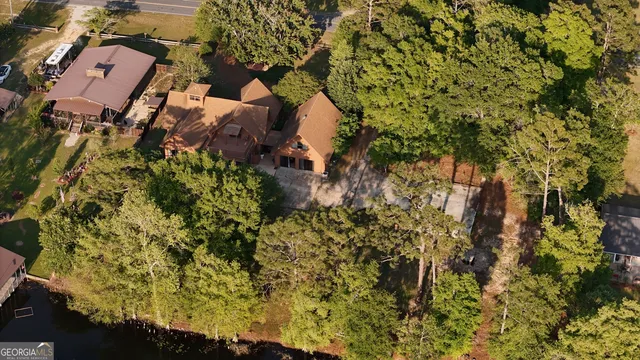 an aerial view of residential house with parking space