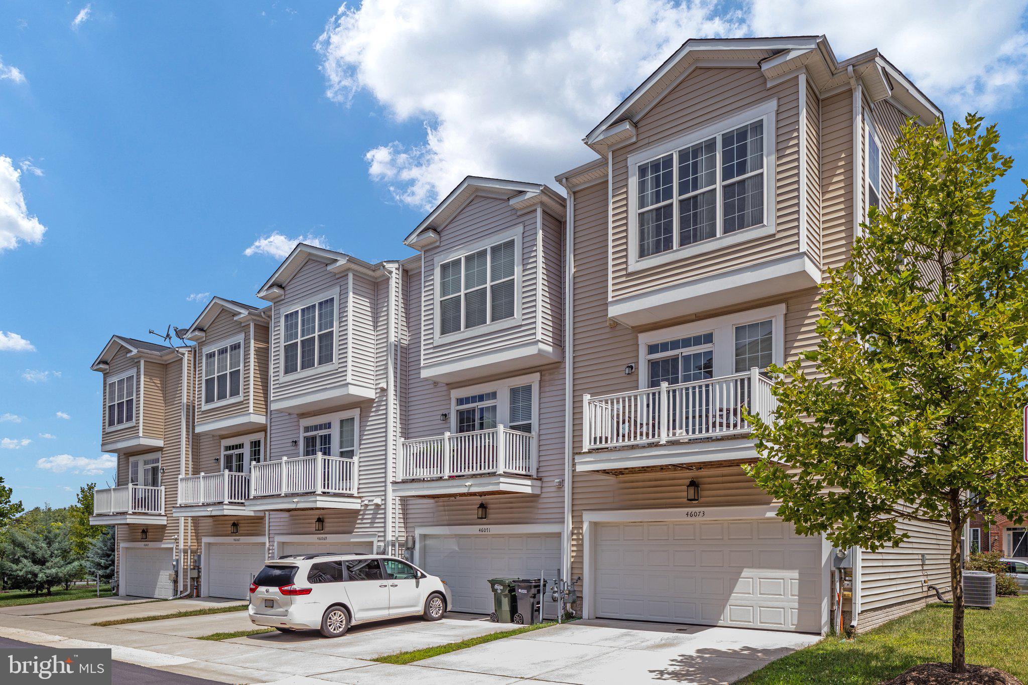 46073 Hall Road Sterling, VA 20166 - Photo 29 of 31 End unit with rear loading garage and driveway