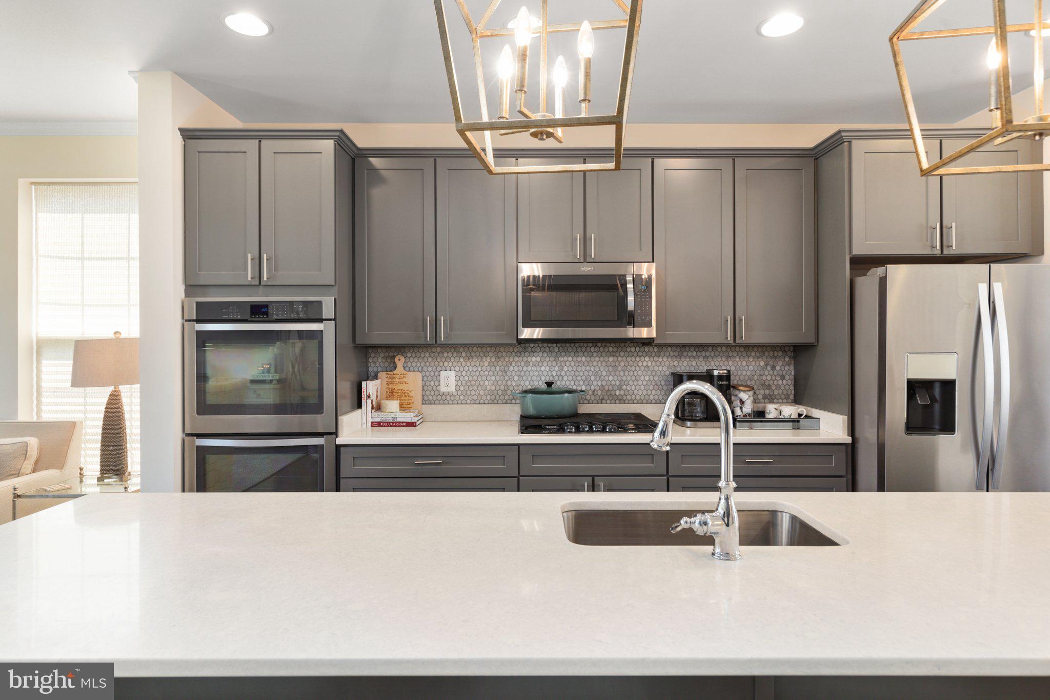 46073 Hall Road Sterling, VA 20166 - Photo 7 of 31 Stylish gray cabinetry